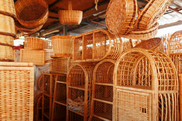 Handmade wicker furniture, products and souvenirs at the street craft market.