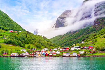 Beautiful idyllic landscape of the fjord Naeroyfjord in Gudvangen, Norway. A small traditional...