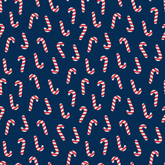 Seamless christmas pattern with caramel cane on a blue background. Cute vector illustration Poster for your business design.