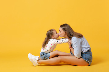 Woman in light clothes have fun with cute child baby girl 4-5 years old. Mommy little kid daughter...