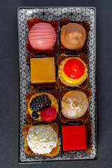 mignon pastry on rectangular ceramic plate