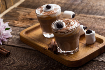 Happy  monster, pumpkin spice latte with big marshmallow eye