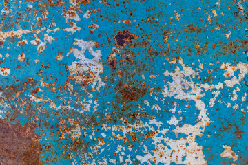 a sheet of metal was coated with paint then painted a different color. time destroyed the coating appeared rust. tectura.