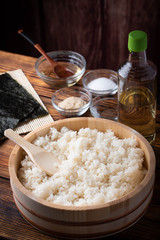 jaoanese sushi rice in wooden bowl with ingredients