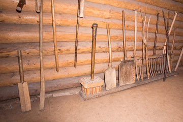 Old, ancient wooden work tools for outdoor work at farm