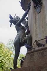 dramatic angle photos of historic landmark monument statue of christopher columbus, in the colonial...