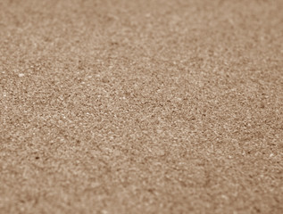 Fototapeta na wymiar Natural cork texture with blur effect in brown color.