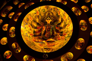 Durga Puja ,Diwali festival or Christmas decoration with warm lights and small idols.