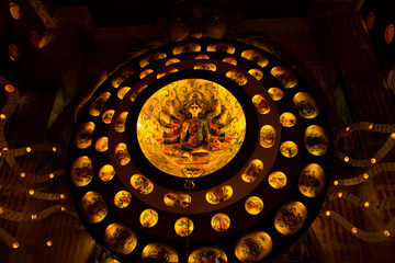 Durga Puja ,Diwali festival or Christmas decoration with warm lights and small idols.