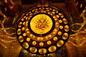 Durga Puja ,Diwali festival or Christmas decoration with warm lights and small idols.