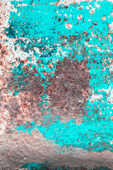 a sheet of metal was coated with paint then painted a different color. time destroyed the coating appeared rust. tectura.