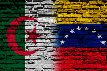 Flag of Algeria and Venezuela on brick wall