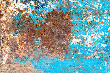 a sheet of metal was coated with paint then painted a different color. time destroyed the coating appeared rust. tectura.