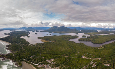 Aerial view over Tofino Pacific Rim national park with drone from above Cox Bay Vancouver Island...