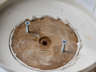 building plaster with wood pattern. gypsum hardens in a bucket
