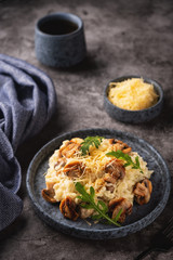 mushroom risotto on a plate, close-up, copy space