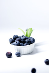 bowl of blueberries with white background 