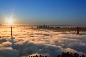 Poster Aerial view of Golden Gate Bridge with Low Fog at Sunrise © Bjorn Bakstad