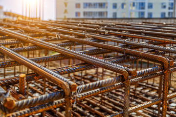 Industrial background. Rebar texture. Rusty rebar for concrete pouring. Steel reinforcement bars. Construction rebar steel work reinforcement. Closeup of Steel rebars.