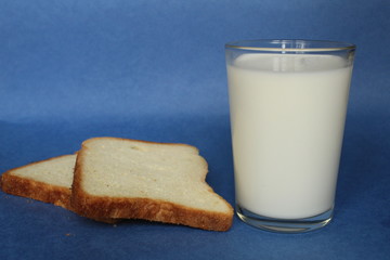 bread and milk on a blue background