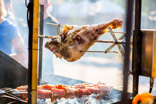 BBQ Meat Roast On A Spit Over An Open Fire