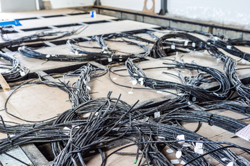 A large number of cables laid in the relay room