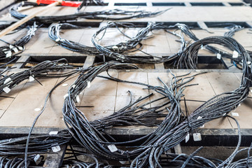A large number of cables laid in the relay room