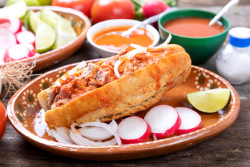 Drowned pork cake with sauce.