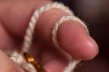 Woman hands knitting crochet.Crochet hook