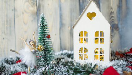 Fototapeta na wymiar Decorative Christmas figurines. Christmas toy soldiers and ballerina from a nutcracker fairy tale. Christmas tree decoration. Festive deco