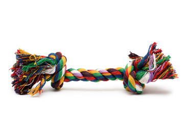 Dog toy isolated on white background. Rope tug toy for fetch or tug-of-war game with a dog