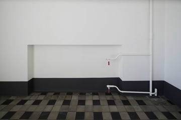 Heating battery on the wall inside the building.