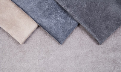 Samples of various colorful textile materials