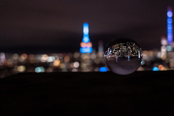 New York in a lensball, New York inside a crystal ball, USA night skyline, view from the Empire...