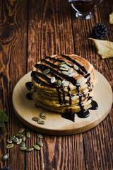 Pumpkin pancakes with chocolate, Thanksgiving day breakfast