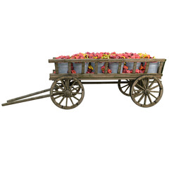 Fototapeta na wymiar Red, yellow pepper in a wooden cart