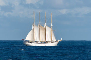 Obraz na płótnie Canvas Sailing ship with four white sails