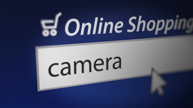 "camera" Typing into Search Engine in Online Shopping Website. Online Shopping Concept