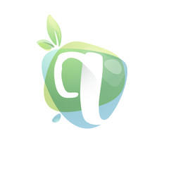 Q letter logo with negative space at green watercolor splash background.