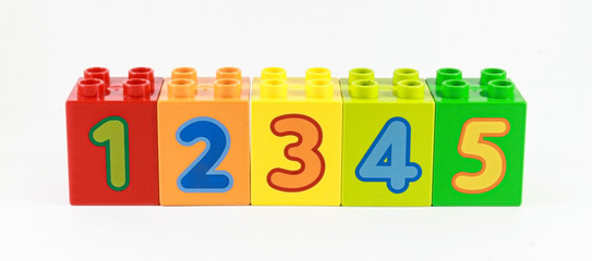 Fototapeta premium Bright and colorful numbers in order from 1 to 5 shown on the designer. training children in counting.