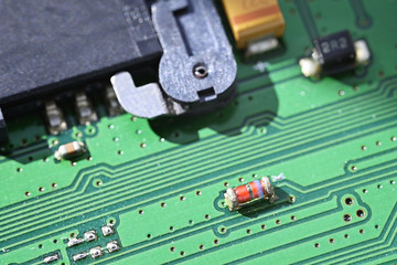 Electronic component rectifier diode on printed circuit board.