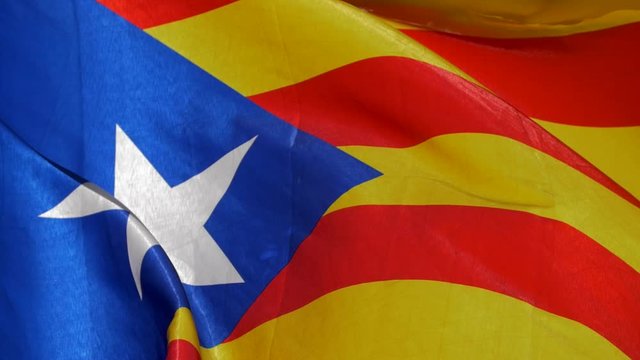 Catalan Flags waving against the blue sky. Catalonia country wants the independence from Spain