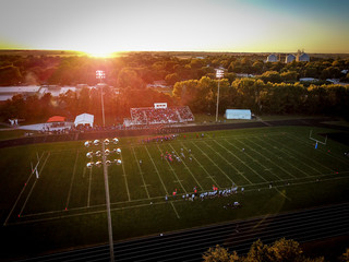 football game at sunset © Cy