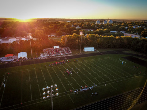 football game at sunset