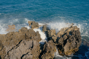 mistral makes waves that splashing on the rocks