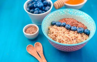buckwheat porridge with fruits, the concept of a healthy breakfast, diet, veganism, vitamins