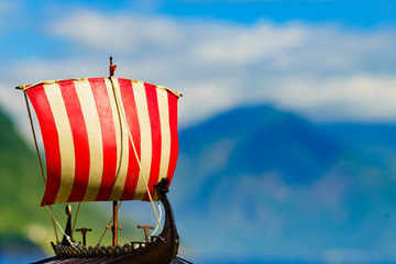 Viking boat on fjord shore, Norway - obrazy, fototapety, plakaty