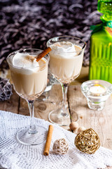 Homemade Eggnog with cinnamon in cups