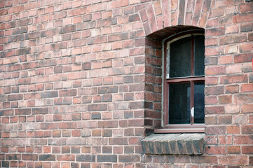 Fototapeta na wymiar window on brick wall