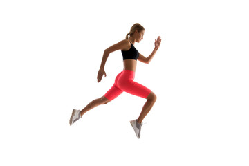 Fototapeta na wymiar Dynamic movement. Woman runner isolated on white. Jogger running. Sporty runner in fashionable sportswear. Fitness and sport motivation. Strong and fit. Athletic woman sprinter or runner. Best runner